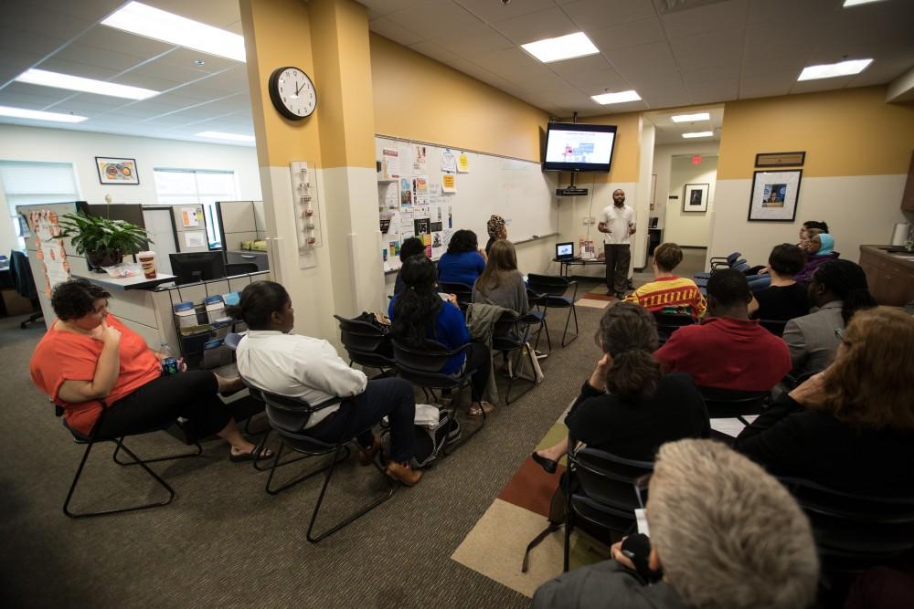 GVL/Kevin Sielaff - ReChard Peel speaks inside the Office of Multicultural Affairs Wednesday, Sept. 21, 2016 as part of Conversations of Color.