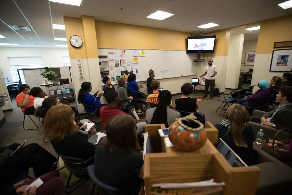 GVL/Kevin Sielaff - ReChard Peel speaks inside the Office of Multicultural Affairs Wednesday, Sept. 21, 2016 as part of Conversations of Color.