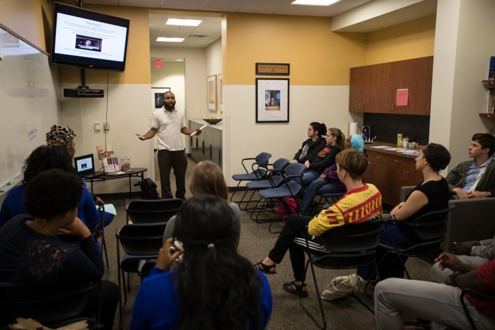 GVL/Kevin Sielaff - ReChard Peel speaks inside the Office of Multicultural Affairs Wednesday, Sept. 21, 2016 as part of Conversations of Color.