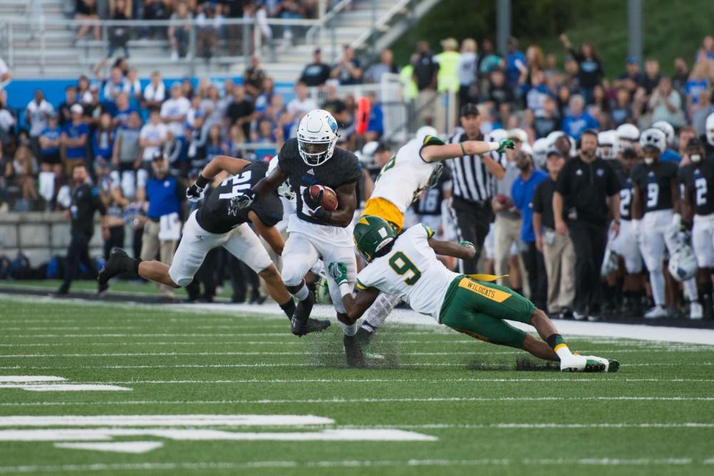 GVL / Luke Holmes - Bart Williams fist pumps after scoring an early touchdown. GVSU defeated Lake Erie College 55-7 on Saturday, Sep. 10, 2016.