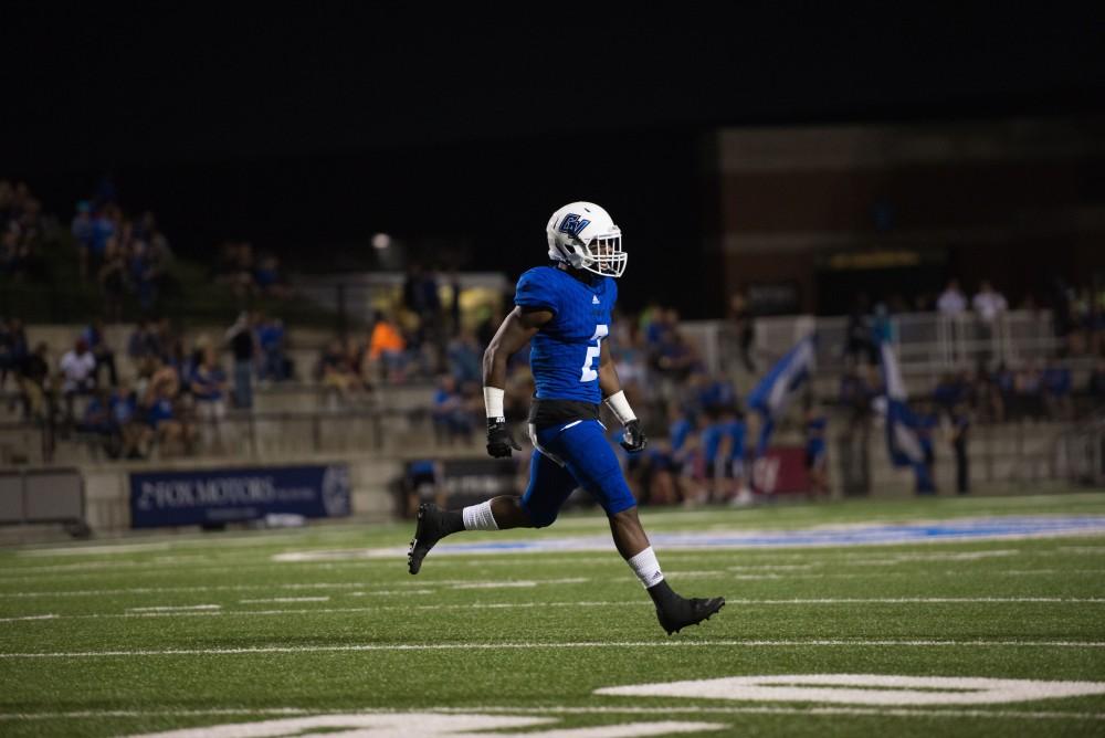 GVL / Luke Holmes - Marquez Gollman (2) runs across the field. Grand Valley State University defeated Tiffin 45-7 on Thursday, Sep. 1, 2016.