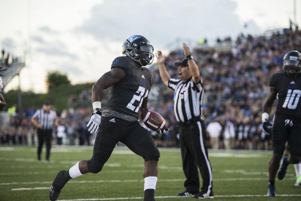 GVL / Luke Holmes - Marty Carter (21) runs in the touchdown.