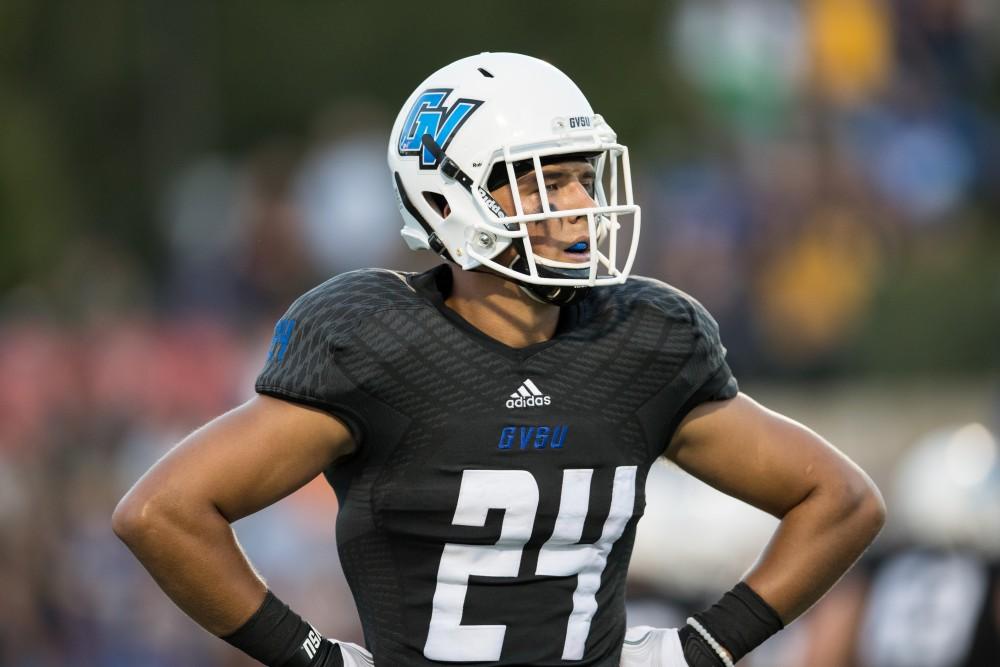 GVL/Kevin Sielaff - Matt Williams (24). The Lakers defeat the Wildcats of Northern Michigan with a final score of 50-24 on Saturday, Sept. 17, 2016 in Allendale.