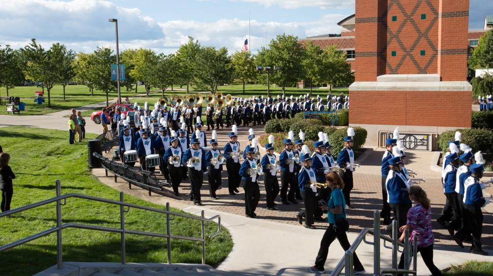 GVL/Kevin Sielaff - The GVSU marching band marches around the clock tower before kick-off. Grand Valley defeats Tiffin with a final score of 45-7 on Thursday, September 1, 2016 at Lubbers Stadium.