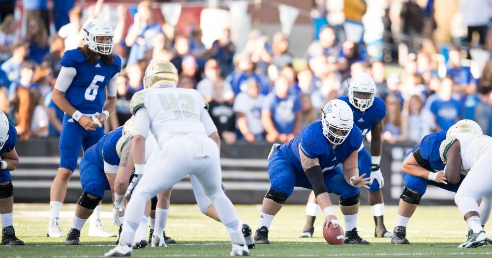 GVL/Kevin Sielaff - Aaron Cox (51) prepares to hike the football. Grand Valley defeats Tiffin with a final score of 45-7 on Thursday, September 1, 2016 at Lubbers Stadium.