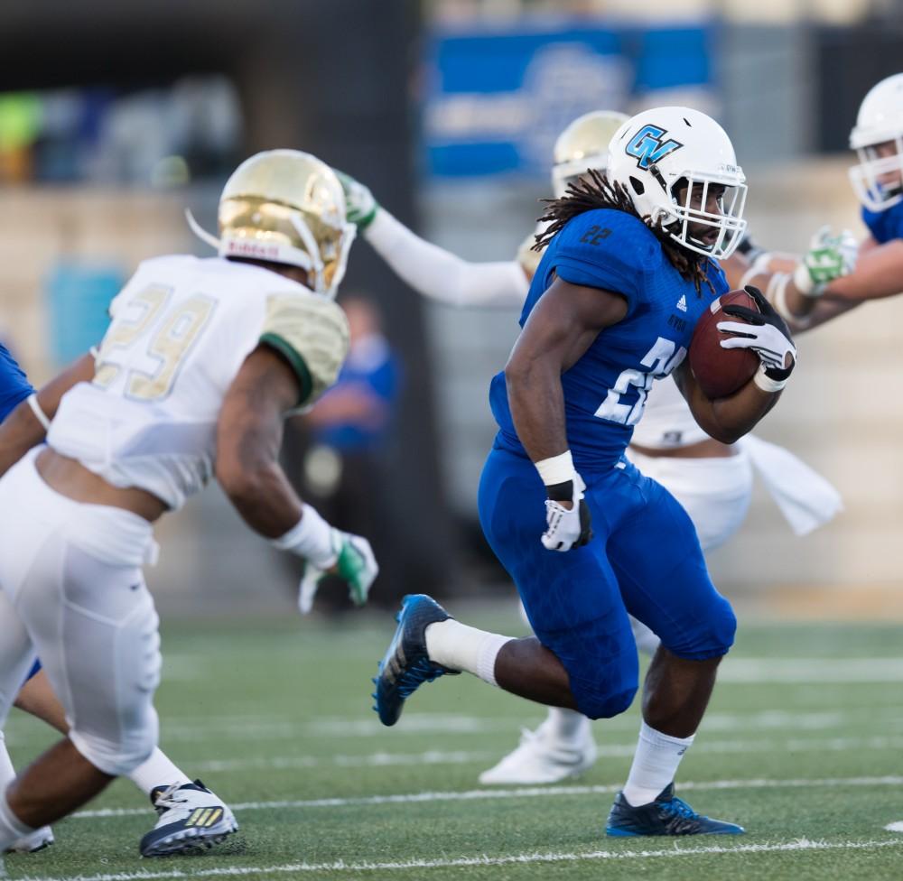 GVL/Kevin Sielaff - 	Terrell Dorsey (22) carries the football up field. Grand Valley defeats Tiffin with a final score of 45-7 on Thursday, September 1, 2016 at Lubbers Stadium.