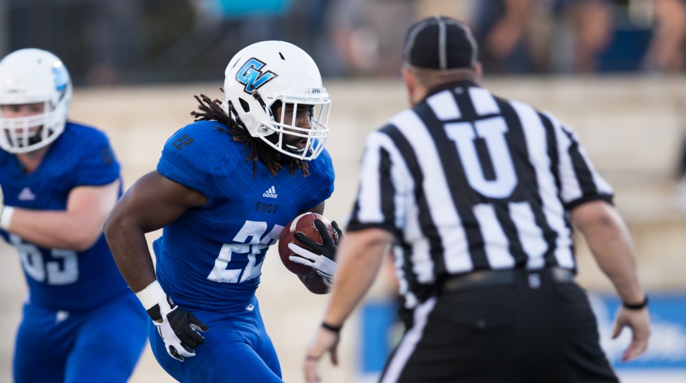 GVL/Kevin Sielaff - 	Terrell Dorsey (22) carries the football up field. Grand Valley defeats Tiffin with a final score of 45-7 on Thursday, September 1, 2016 at Lubbers Stadium.