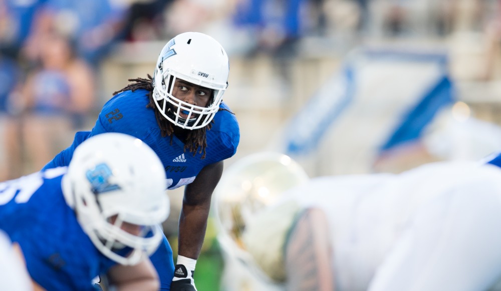 GVL/Kevin Sielaff - Terrell Dorsey (22) sets himself on the line of scrimmage and waits for the football to be put into play. Grand Valley defeats Tiffin with a final score of 45-7 on Thursday, September 1, 2016 at Lubbers Stadium.