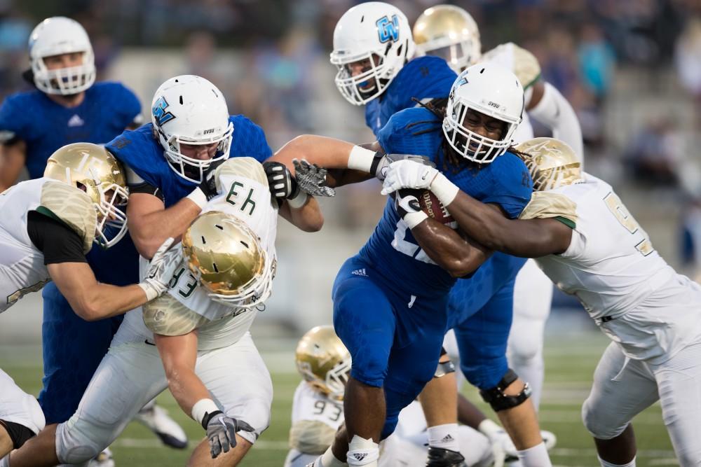 GVL/Kevin Sielaff - Terrell Dorsey (22) forces his way up field. Grand Valley defeats Tiffin with a final score of 45-7 on Thursday, September 1, 2016 at Lubbers Stadium.