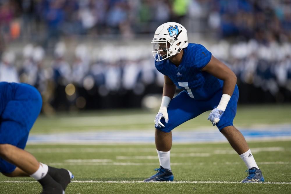 GVL/Kevin Sielaff - David Talley (7) sets himself on the line of scrimmage. Grand Valley defeats Tiffin with a final score of 45-7 on Thursday, September 1, 2016 at Lubbers Stadium.