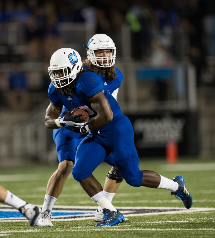 GVL/Kevin Sielaff - Terrell Dorsey (22) receives a hand-off and moves up field. Grand Valley defeats Tiffin with a final score of 45-7 on Thursday, September 1, 2016 at Lubbers Stadium.