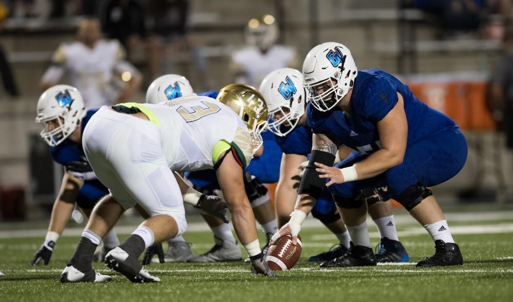 GVL/Kevin Sielaff - Aaron Cox (51) hikes the football. Grand Valley defeats Tiffin with a final score of 45-7 on Thursday, September 1, 2016 at Lubbers Stadium.