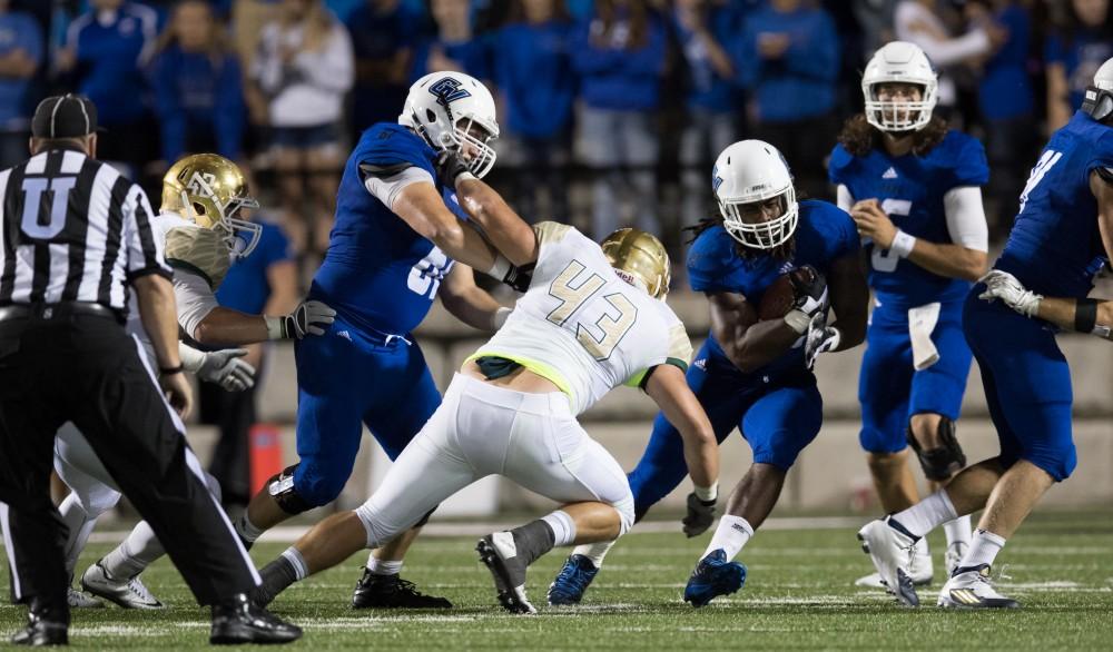 GVL/Kevin Sielaff - Terrell Dorsey (22) jukes his way up field. Grand Valley defeats Tiffin with a final score of 45-7 on Thursday, September 1, 2016 at Lubbers Stadium.