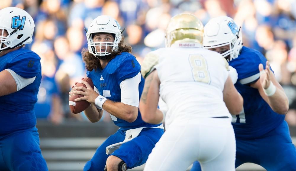 GVL/Kevin Sielaff - Bart Williams (6) steps back in the pocket and looks to throw. Grand Valley defeats Tiffin with a final score of 45-7 on Thursday, September 1, 2016 at Lubbers Stadium.