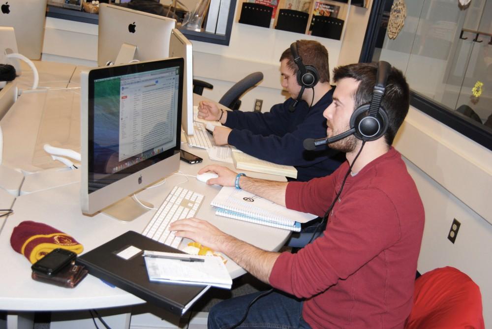 GVL/Archive - James McAlloon (right) Nicolo Genovali (left) working in the LRC (Language Resource Center) Thursday, Feb. 12, 2015.