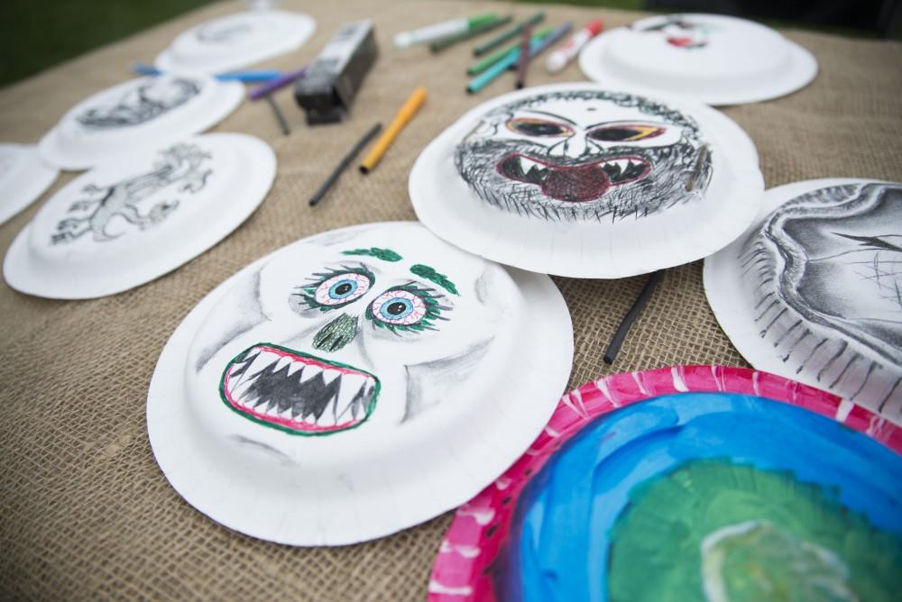 GVL / Luke Holmes - Students decorated plates to be Roman shields.The Paleo-Olympics were held in the KC West Lawn on Friday, Sept. 23, 2016.