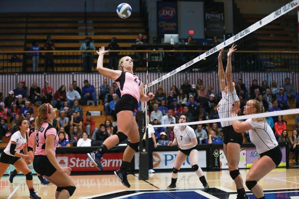 GVL / Kevin Sielaff - Staci Brower (21) winds up for a kill. Grand Valley squares off against Ohio Dominican and claims the victory with a final score of 3-1.