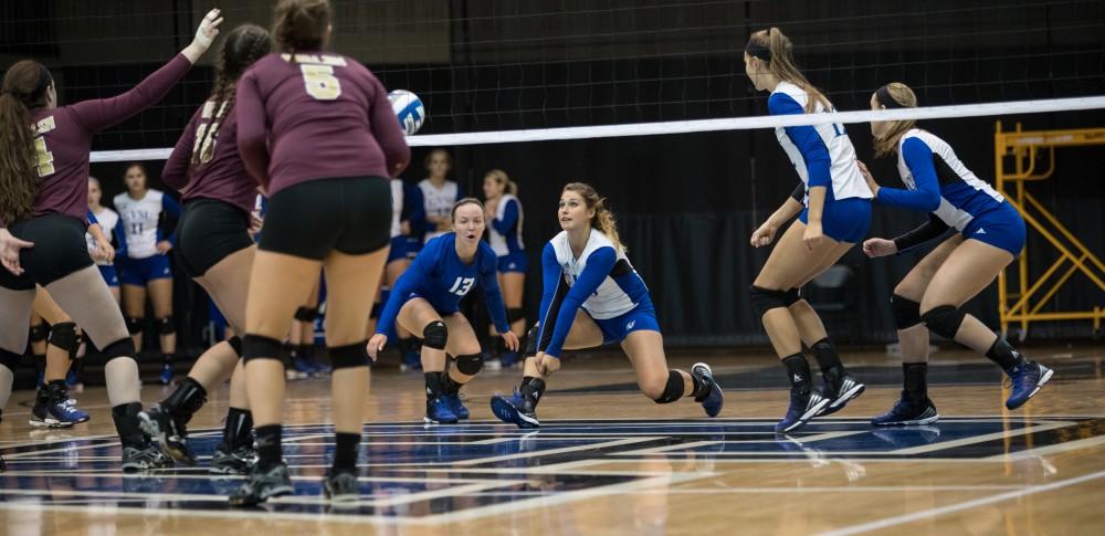 GVL/Kevin Sielaff - Brooke Smith (8) dives for the ball. The Lakers sweep the Cavaliers of Walsh University Saturday, Sept. 24, 2016 in Allendale.