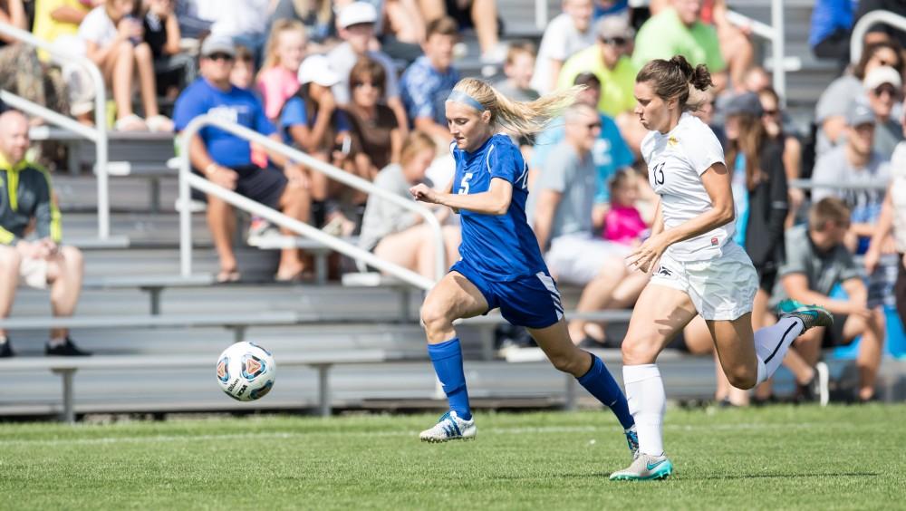 GVL/Kevin Sielaff - Kendra Stauffer (5) breaks through the Panthers' defense and heads toward the net. The Lakers defeat the Panthers of Ohio Dominican with a final score of 4-0 on Sunday, Sept. 18, 2016 in Allendale.