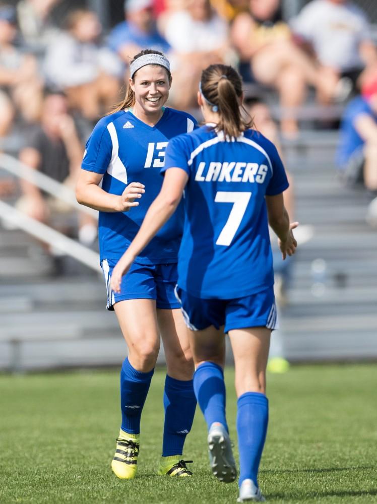 GVL/Kevin Sielaff - Mari Corby (13) and Clare Carlson (7) celebrate a Grand Valley goal. The Lakers defeat the Panthers of Ohio Dominican with a final score of 4-0 on Sunday, Sept. 18, 2016 in Allendale.