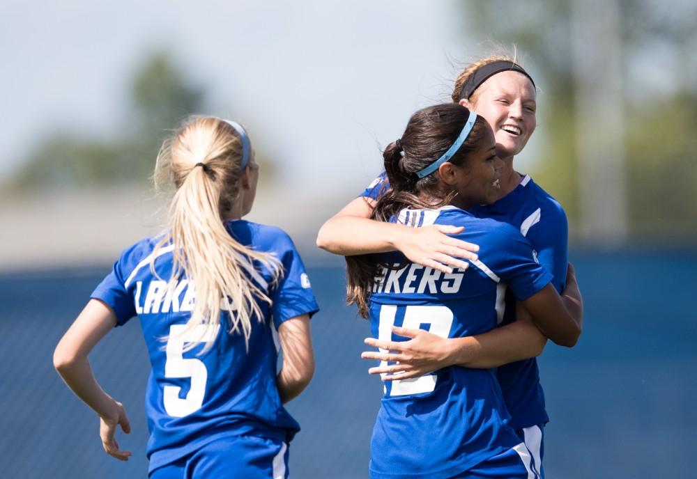 GVL/Kevin Sielaff - Madz Ham (9) and Jayma Martin (12) celebrate a Grand Valley goal. The Lakers defeat the Panthers of Ohio Dominican with a final score of 4-0 on Sunday, Sept. 18, 2016 in Allendale.