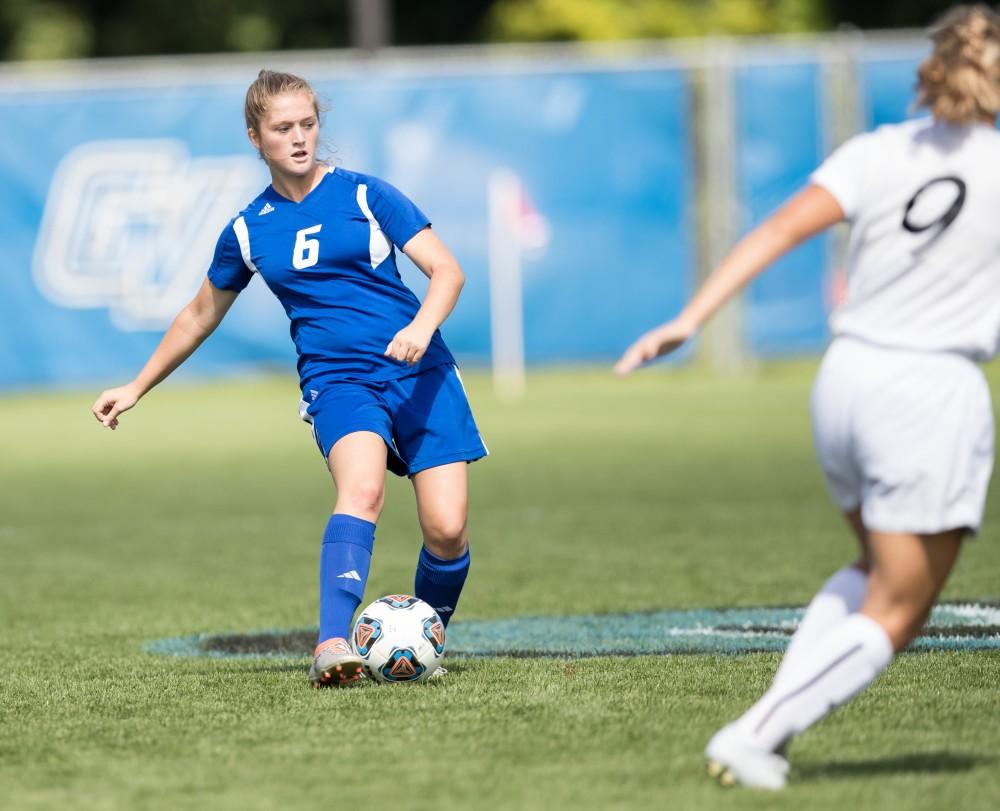 GVL/Kevin Sielaff - Marisa Pyden (6) passes the ball off around midfield. The Lakers defeat the Panthers of Ohio Dominican with a final score of 4-0 on Sunday, Sept. 18, 2016 in Allendale.