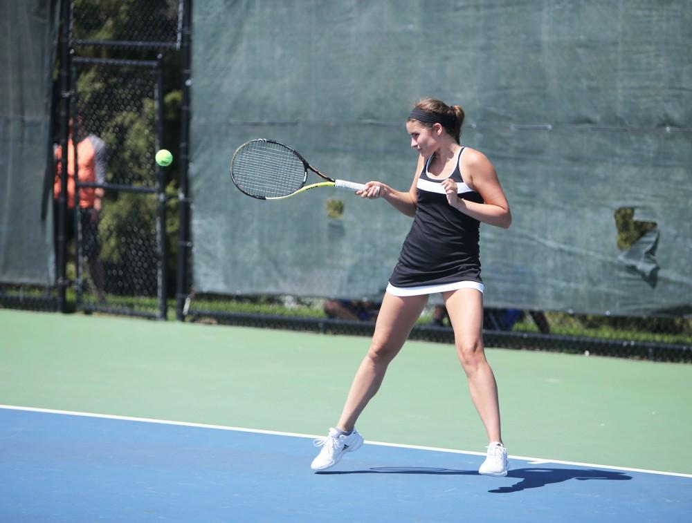 GVL / Emily Frye
Sophomore Nikki Heiniger hits the serve during a spring match on April 17, 2016.