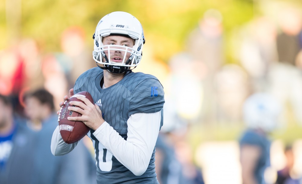 GVL/Kevin Sielaff - Matt Crable (16) warms up before the start of the match. The Lakers defeat the Bulldogs of Ferris State University Saturday, Oct. 8, 2016 with a final score of 35-23 in Allendale. 