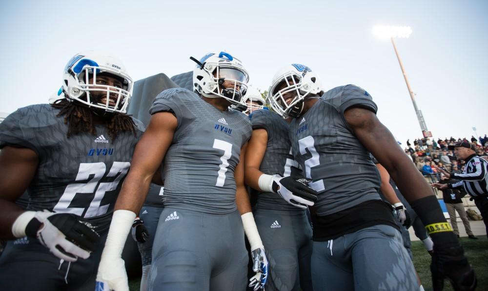 GVL/Kevin Sielaff - David Talley (7) and company prepare to storm the field as the pre-game show winds down. The Lakers defeat the Bulldogs of Ferris State University Saturday, Oct. 8, 2016 with a final score of 35-23 in Allendale. 