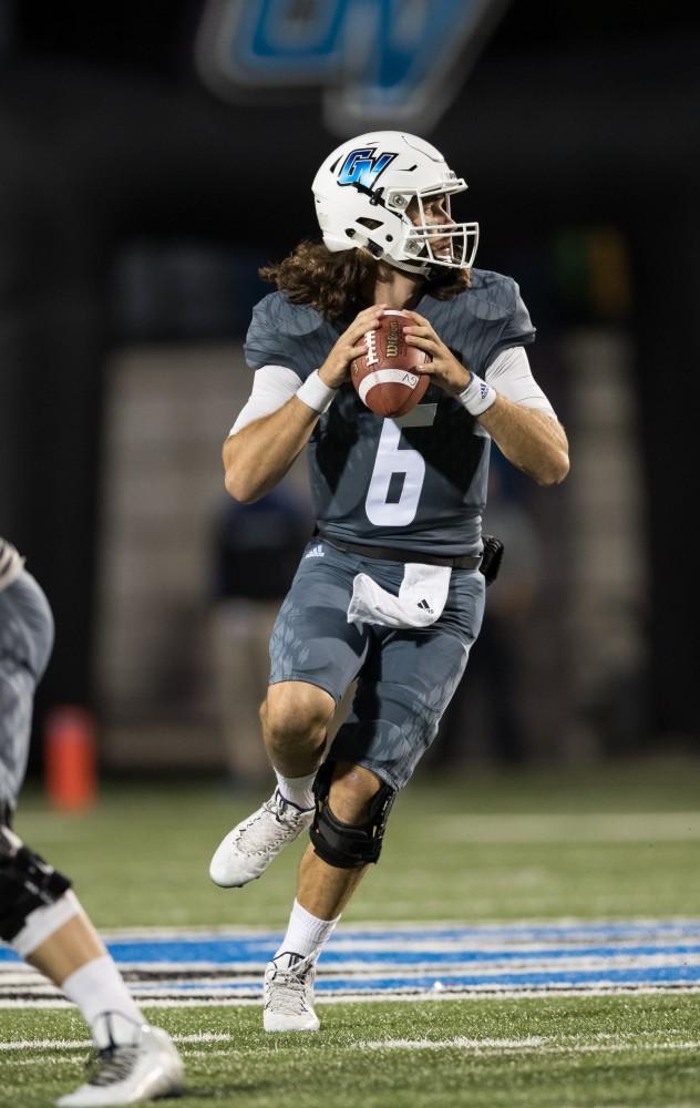 GVL/Kevin Sielaff - Bart Williams (6) steps back and looks to throw. The Lakers defeat the Bulldogs of Ferris State University Saturday, Oct. 8, 2016 with a final score of 35-23 in Allendale. 