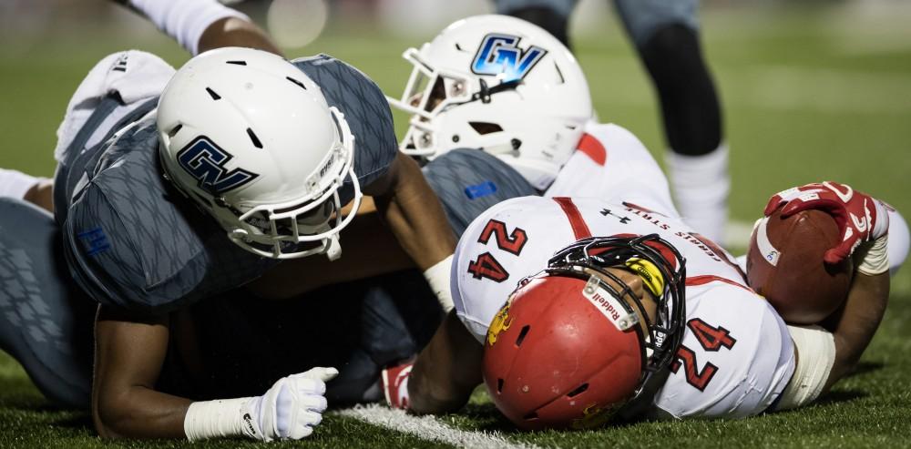 GVL/Kevin Sielaff - Jahaan Brown (24) of Ferris is leveled as he tries to break through Grand Valley's defense. The Lakers defeat the Bulldogs of Ferris State University Saturday, Oct. 8, 2016 with a final score of 35-23 in Allendale. 