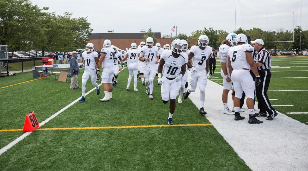 GVL/Kevin Sielaff - Urston Smith (10) and company enter the field before the start of that match. The Lakers square off against the Panthers of Ohio Dominican University Saturday, Oct. 1, 2016 and win with a final score of 24-21 in Columbus, OH.