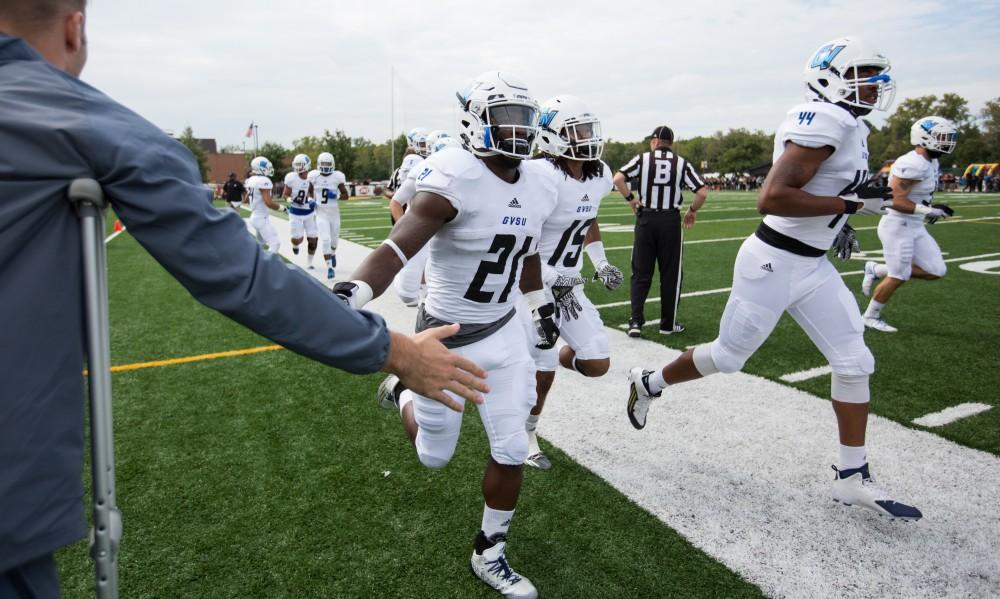 GVL/Kevin Sielaff - Marty Carter (21) enters the field before the start of the match. The Lakers square off against the Panthers of Ohio Dominican University Saturday, Oct. 1, 2016 and win with a final score of 24-21 in Columbus, OH.