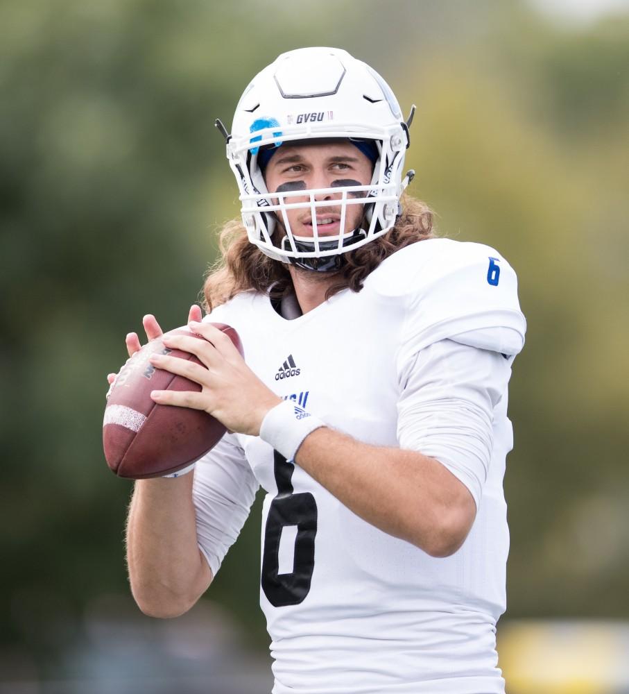 GVL/Kevin Sielaff - Bart Williams (6) warms up on the sideline as the game gets underway. The Lakers square off against the Panthers of Ohio Dominican University Saturday, Oct. 1, 2016 and win with a final score of 24-21 in Columbus, OH.