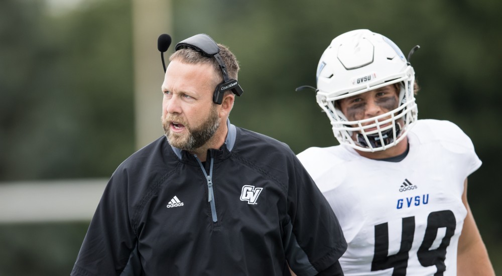 GVL/Kevin Sielaff - Head coach Matt Mitchell has words with Grand Valley's defensive line as they prepare to punt  the ball away. The Lakers square off against the Panthers of Ohio Dominican University Saturday, Oct. 1, 2016 and win with a final score of 24-21 in Columbus, OH.