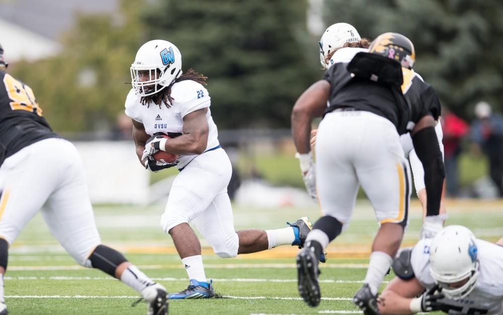 GVL/Kevin Sielaff - Terrell Dorsey (22) receives a hand-off and makes his way down field. The Lakers square off against the Panthers of Ohio Dominican University Saturday, Oct. 1, 2016 and win with a final score of 24-21 in Columbus, OH.