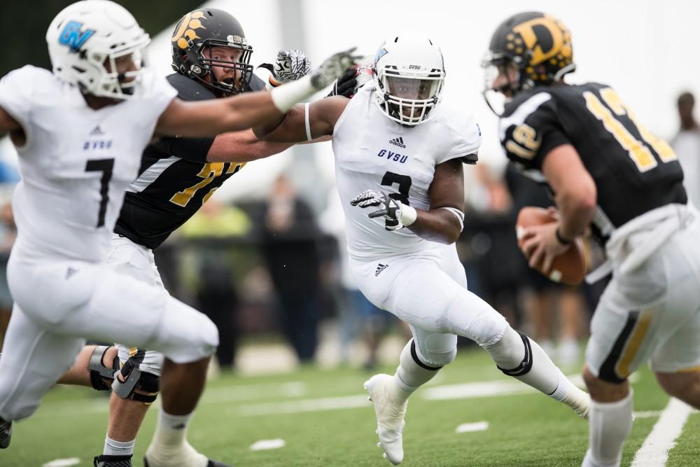 GVL/Kevin Sielaff - Sydney Omameh (3) moves in on the Panthers' quarterback. The Lakers square off against the Panthers of Ohio Dominican University Saturday, Oct. 1, 2016 and win with a final score of 24-21 in Columbus, OH.