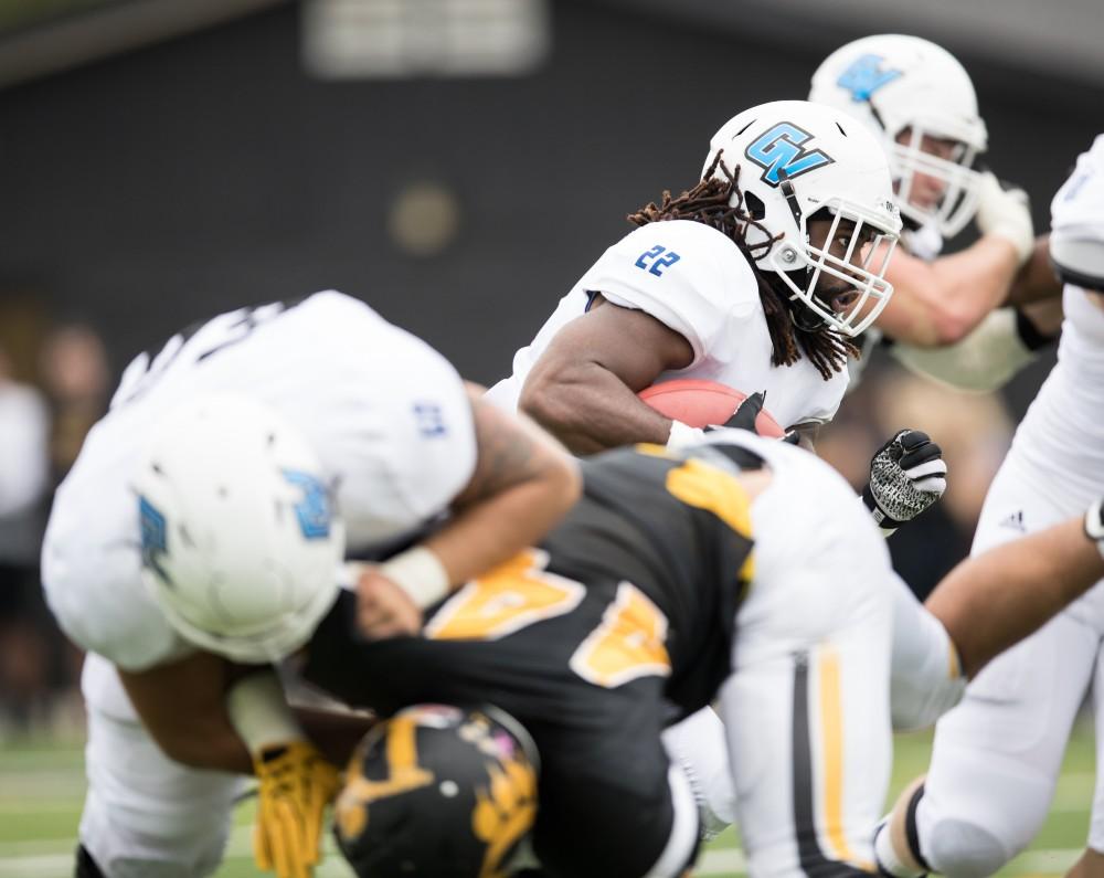 GVL/Kevin Sielaff - Terrell Dorsey (22) moves the ball up through the pocket. The Lakers square off against the Panthers of Ohio Dominican University Saturday, Oct. 1, 2016 and win with a final score of 24-21 in Columbus, OH.