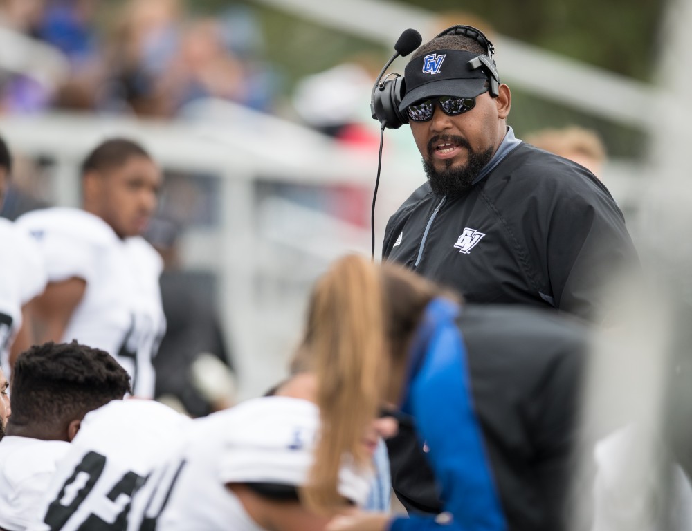 GVL/Kevin Sielaff - E.J. Whitlow speaks with the defensive line as Grand Valley's offense takes the field. The Lakers square off against the Panthers of Ohio Dominican University Saturday, Oct. 1, 2016 and win with a final score of 24-21 in Columbus, OH.