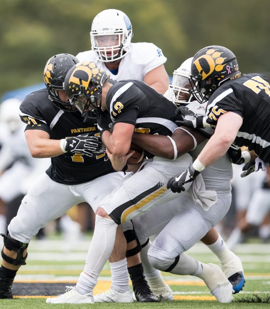 GVL/Kevin Sielaff - Sydney Omameh (3) moves in Ohio Dominican's Grant Russell (12) for the sack. The Lakers square off against the Panthers of Ohio Dominican University Saturday, Oct. 1, 2016 and win with a final score of 24-21 in Columbus, OH.