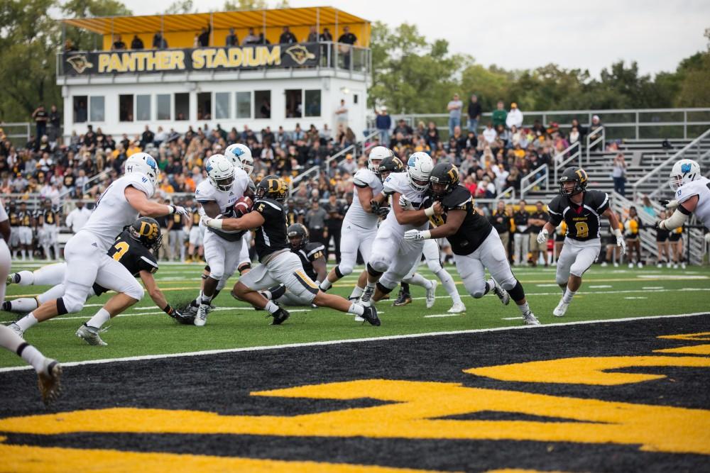 GVL/Kevin Sielaff - Marty Carter (21) carries the ball in for a Grand Valley touchdown. The Lakers square off against the Panthers of Ohio Dominican University Saturday, Oct. 1, 2016 and win with a final score of 24-21 in Columbus, OH.