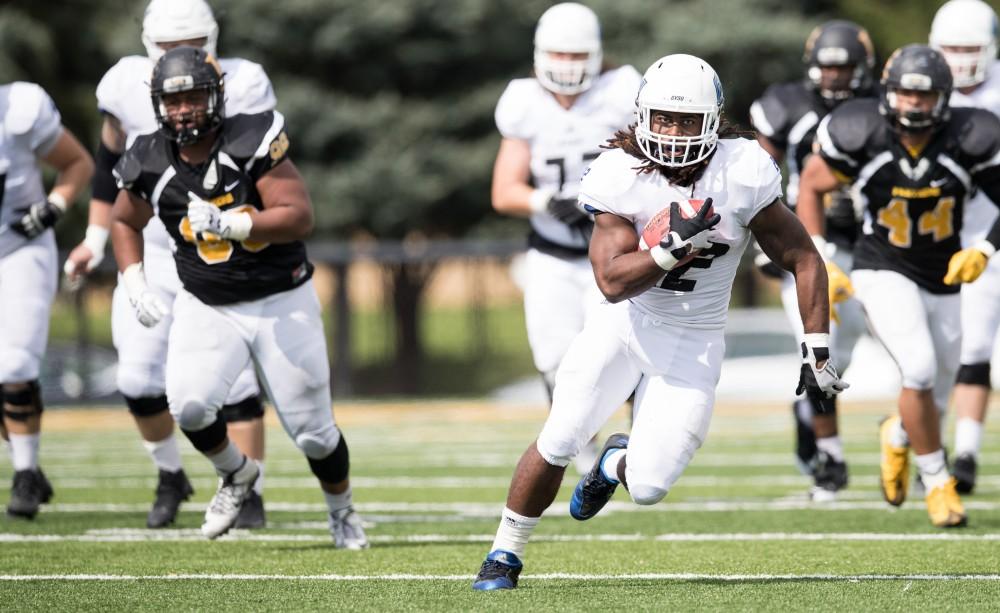 GVL/Kevin Sielaff - Terrell Dorsey (22) receives a hand-off and moves the ball down field. The Lakers square off against the Panthers of Ohio Dominican University Saturday, Oct. 1, 2016 and win with a final score of 24-21 in Columbus, OH.