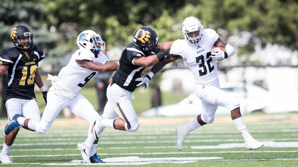 GVL/Kevin Sielaff - Donte Carey (32) fields and kick off and tries to break a tackle as he heads down field. The Lakers square off against the Panthers of Ohio Dominican University Saturday, Oct. 1, 2016 and win with a final score of 24-21 in Columbus, OH.