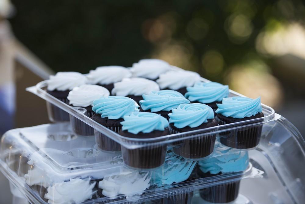 GVL / Luke Holmes - Delicious cupcakes were passed out next to the clock tower. GVSU Founders Day was celebrated on Tuesday, Oct. 25, 2016 next to the clock tower.