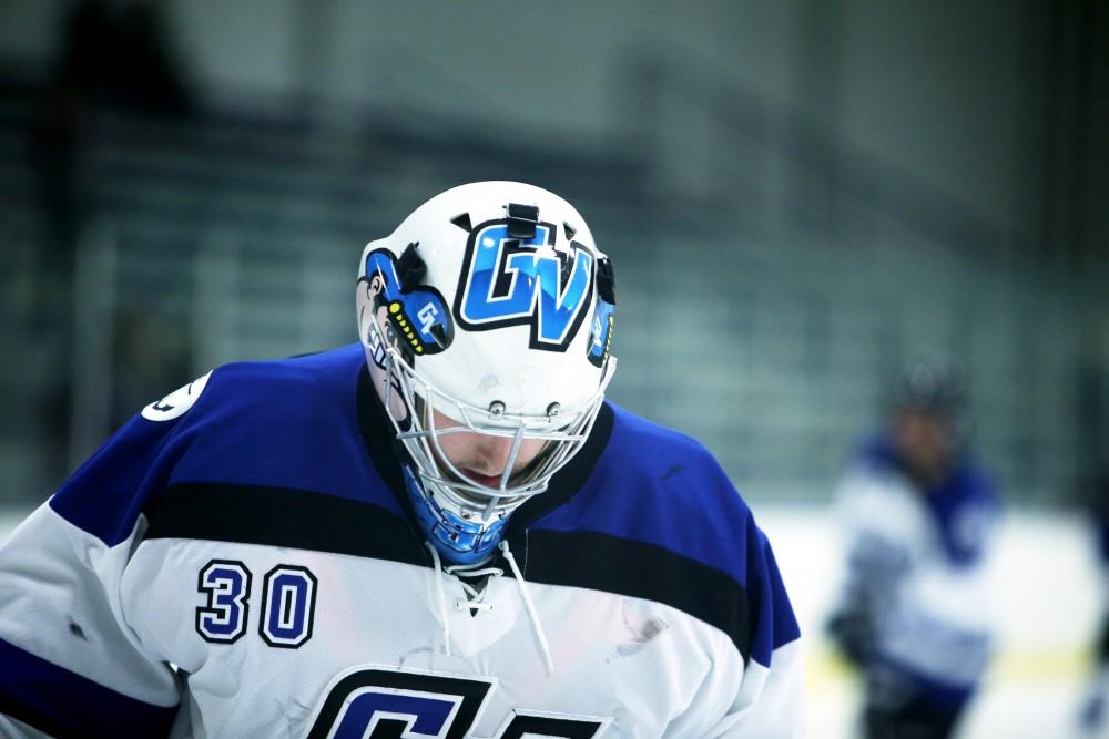 GVL / Emily Frye
Goalie Spencer Craig takes a moment before the start of the game on Friday Oct. 7, 2016 against Rochester College. 