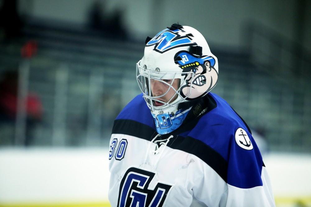 GVL / Emily Frye
Goalie Spencer Craig takes a moment before the start of the game on Friday Oct. 7, 2016 against Rochester College.