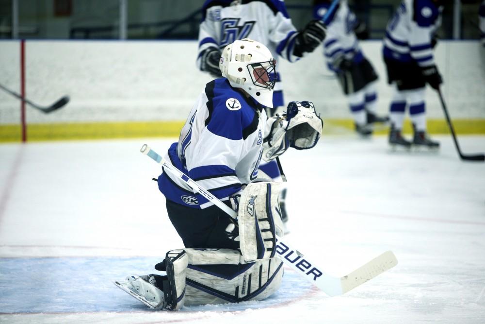 GVL / Emily Frye
Goalie Spencer Craig warms up before the game on Friday Oct. 7, 2016 against Rochester College.