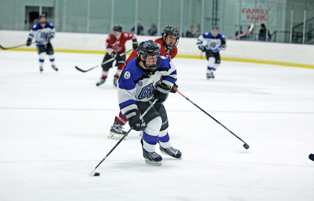 GVL / Emily Frye
The Lakers take the puck down the rink on Friday Oct. 7, 2016 against Rochester College.