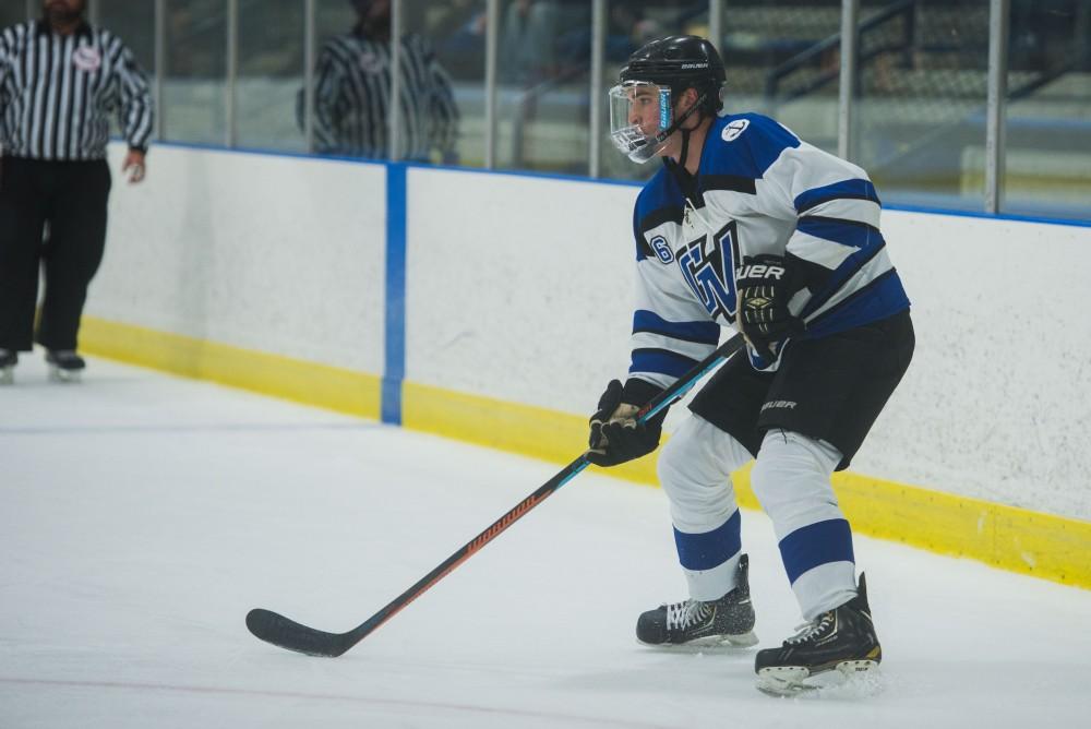 GVL / Luke Holmes - Zach Resnick (6) looks to pass the puck. GVSU Men’s D2 Hockey defeated Ferris State University with a score of 8-1 on Saturday, Oct. 16, 2016.