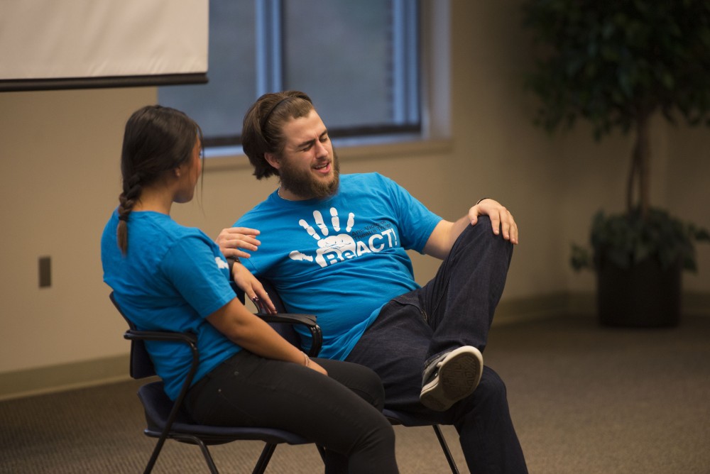 GVL / Luke Holmes - Students perform a short skit to raise awareness of rape. “It’s On Us: Champions of Change Kickoff” was held in the Pere Marquette room on Friday, Oct. 7, 2016.